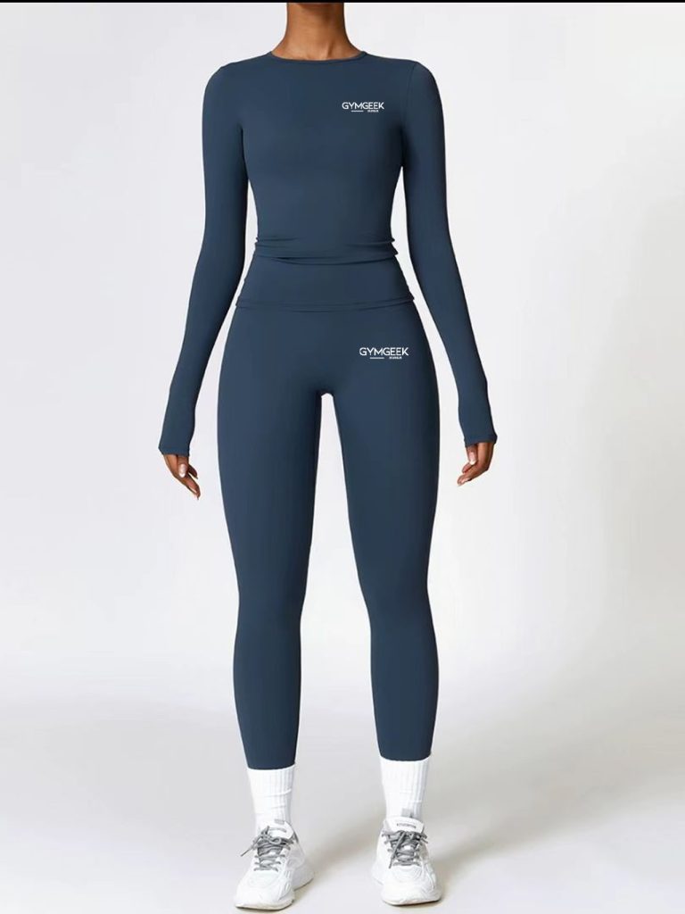 Sleek seamless long-sleeve top and Powerhold high-waisted leggings by Gym Geek, ideal for high-performance workouts in Navy blue.